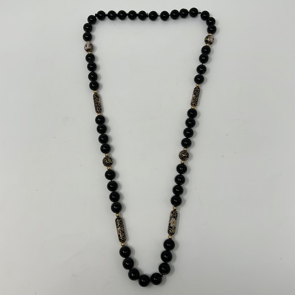 Beautiful vintage necklace from beads. Some beads have hand painted design.